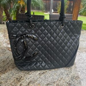 Chanel 
Cambon Tote Black Quilted Lambskin Patent CC Shoulder Bag Large